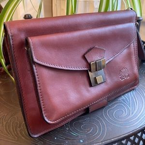 Vintage leather travel/carry-all clutch/wristlet.